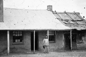 Chinese man outside a house, Tambaroora, ON 4 Box 12 No 80007 Digital order no: a2822969 State Library of NSW